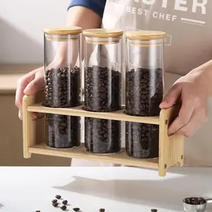 3 قطع من الأوعية الزجاجية مع أغطية من الخيزران، حاويات تخزين شفافة مع قاعدة وحامل من خشب الخيزران، منظمات محكمة الإغلاق للوجبات الخفيفة